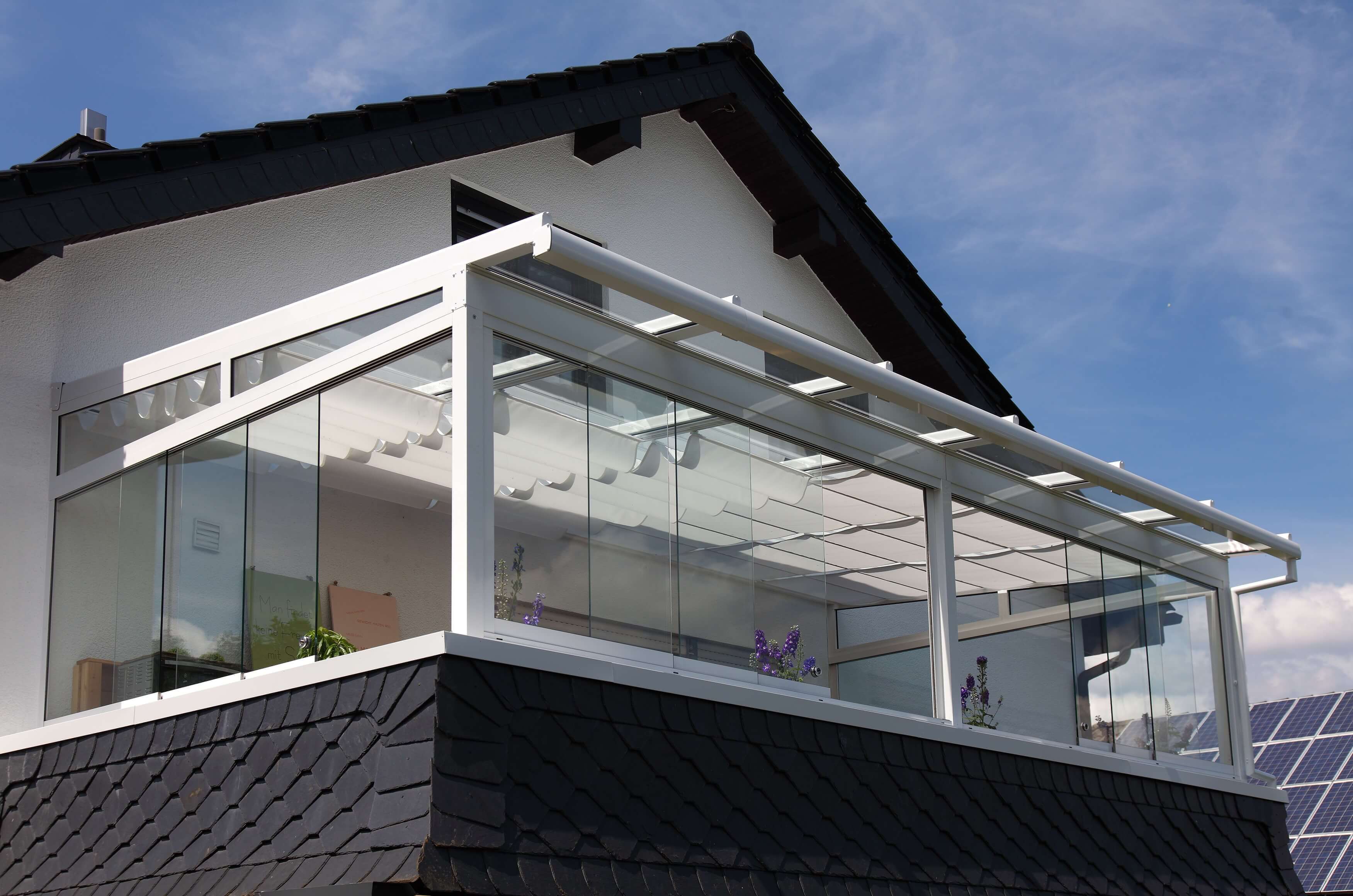 moderne_Terrassenüberdachung_Wintergarten_aus_Glas